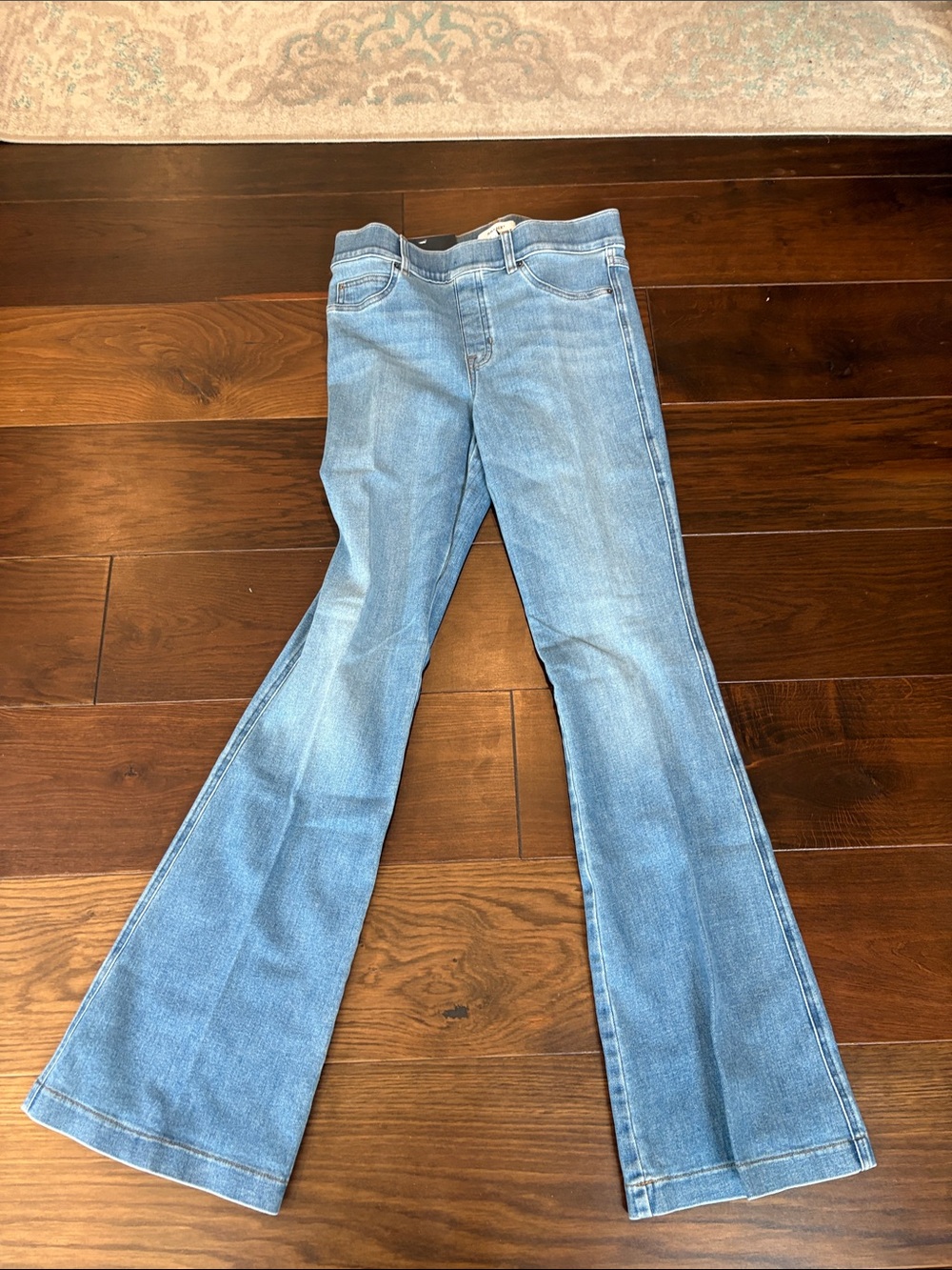 SPANX Light Blue Denim Flare Jeans with Branded Tag